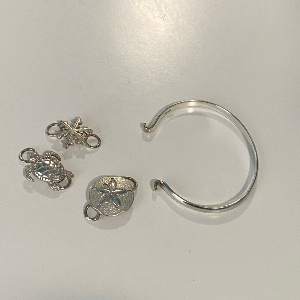 Sterling silver cuff bracelet with 3 interchangeable charms